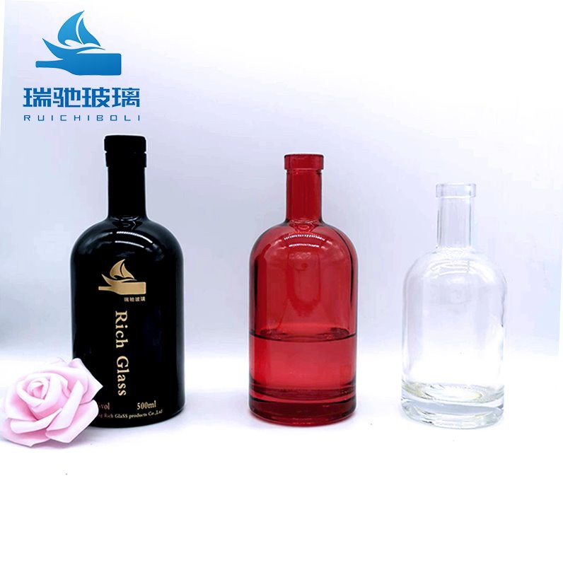 colored glass bottles with corks